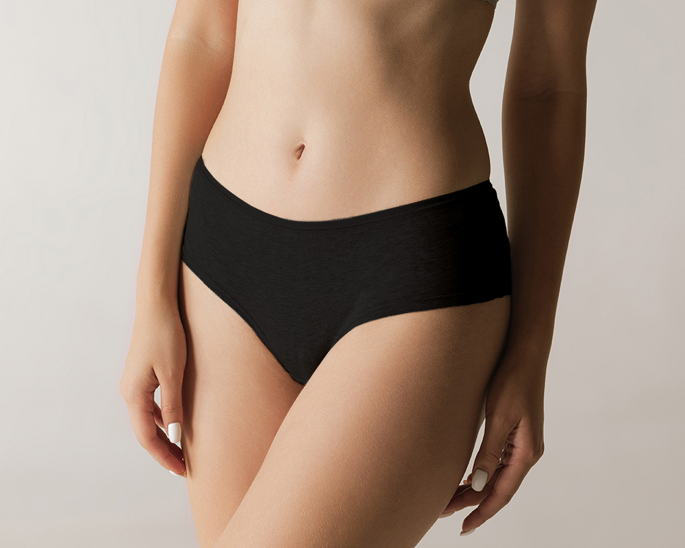 Darstellung des weiblichen Intimbereichs in schwarzer Unterwäsche als neutrale medizinische Visualisierung möglicher Behandlungszonen in der Intimchirurgie der Sophienklinik Stuttgart.